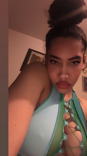 Customer photo review of Sleeveless sheer lace up crop top