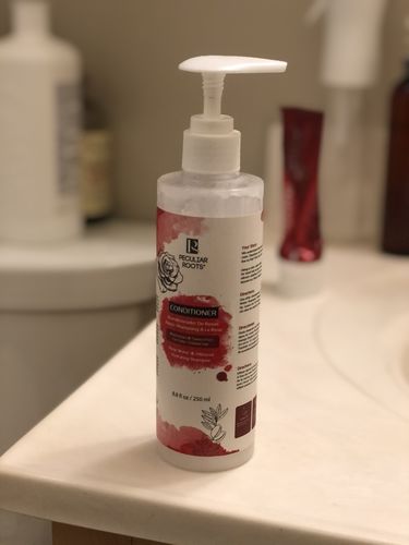 Customer photo review of Rose Water & Hibiscus Color-Treated Conditioner |  8 oz