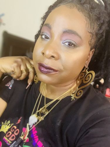 Customer photo review of Sankofa Adinkra Necklace