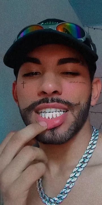 Customer photo review of Two-Tone Iced Grillz