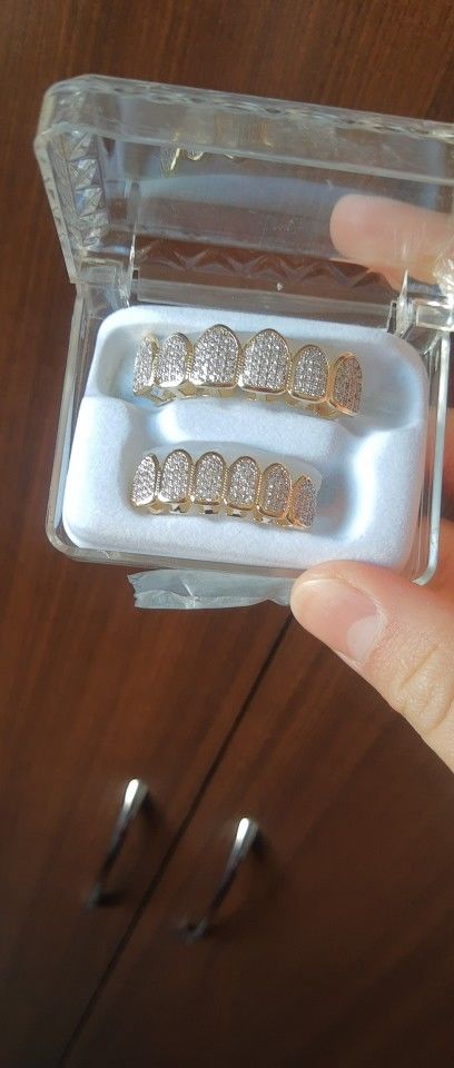 Customer photo review of Two-Tone Iced Grillz