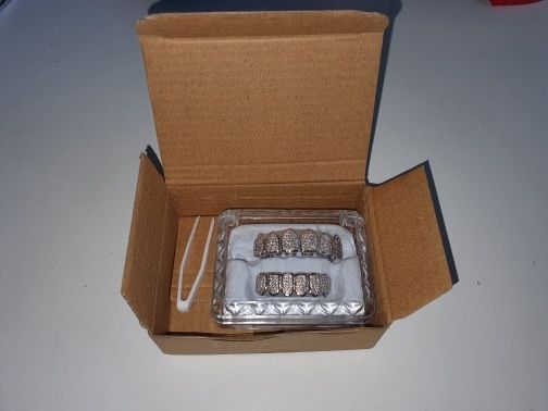 Customer photo review of Two-Tone Iced Grillz