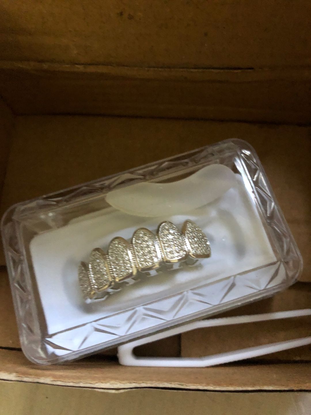 Customer photo review of Two-Tone Iced Grillz