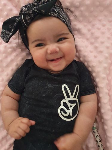 Customer photo review of MLW By Design - Peace Yo! Stonewash Bodysuit