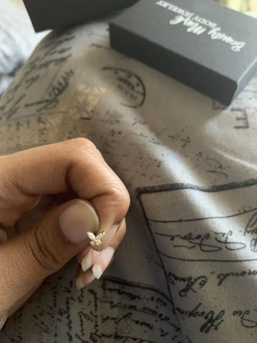 Customer photo review of Butterfly Surgical Steel L-Bend Nose Ring
