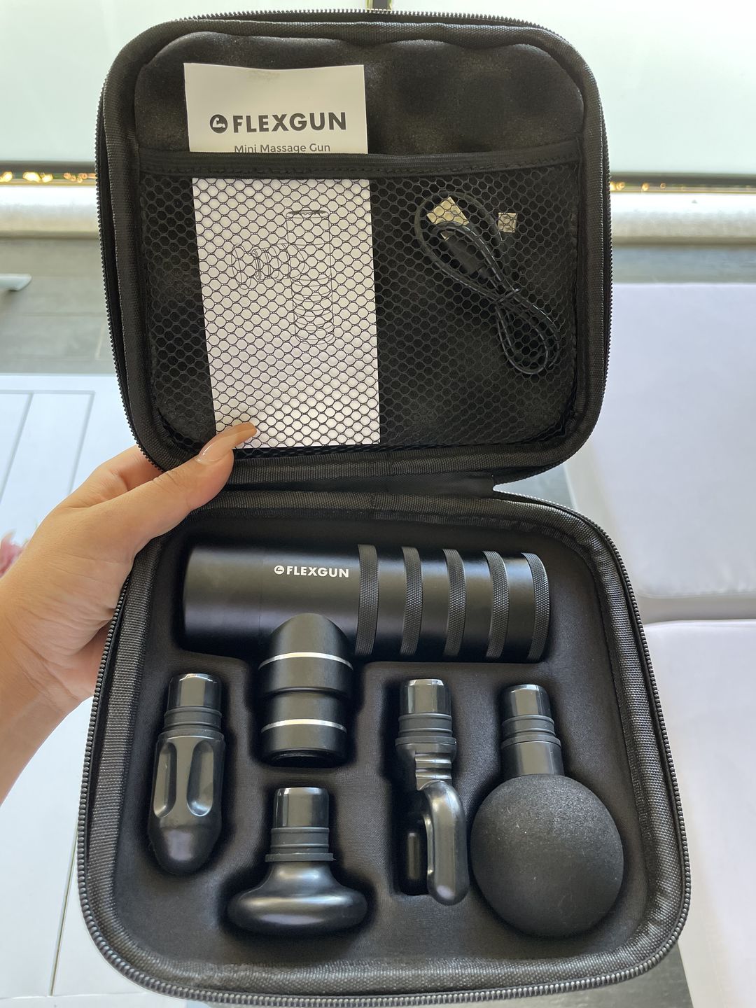 Customer photo review of Flexgun mini. Compact on-the-go treatment.