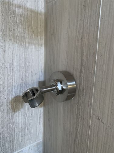 Customer photo review of All Metal Universal Shower Holder To Wall Mount Hand Held Shower Heads
