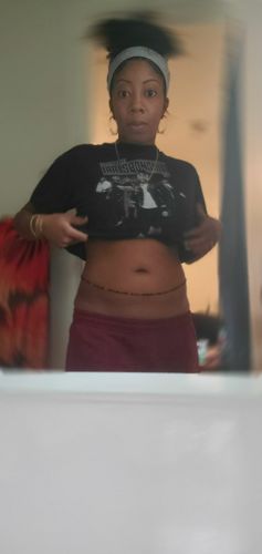 Customer photo review of Black Star Black and Gold Tie On Waist Beads