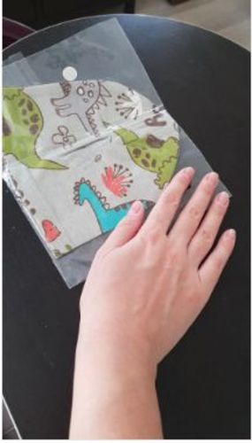 Customer photo review of Bonnet Dinosaure Enfant Gris