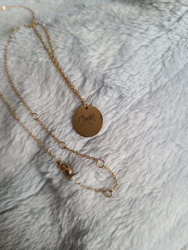 Customer photo review of Mia Hand Gesture Necklace