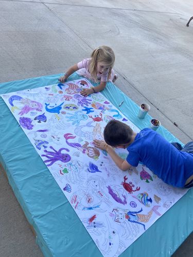 Customer photo review of Mermaids Table Top Coloring Banner