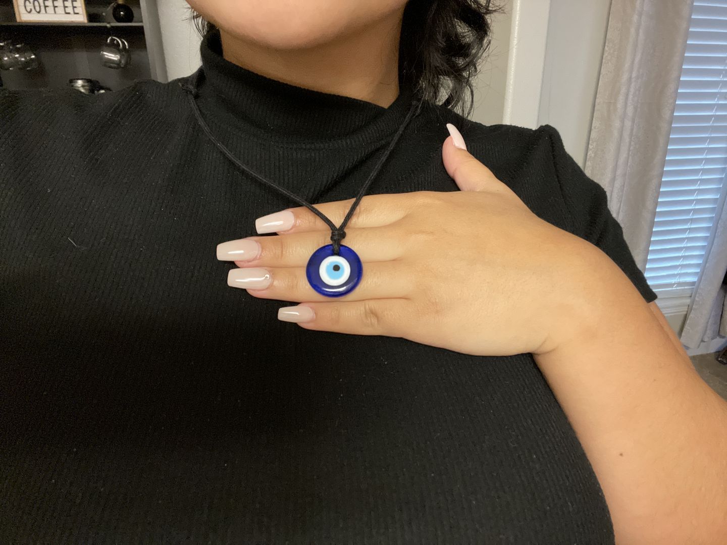 Customer photo review of Glass Evil Eye Good Luck and Protection Necklace