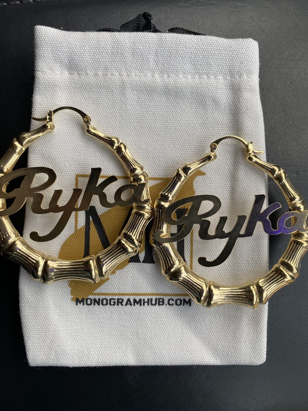 Customer photo review of 2" Bamboo Name Earrings