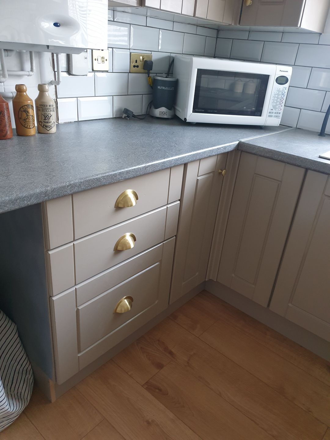 Customer photo review of Monmouth Brushed Satin Brass Cupboard Handles