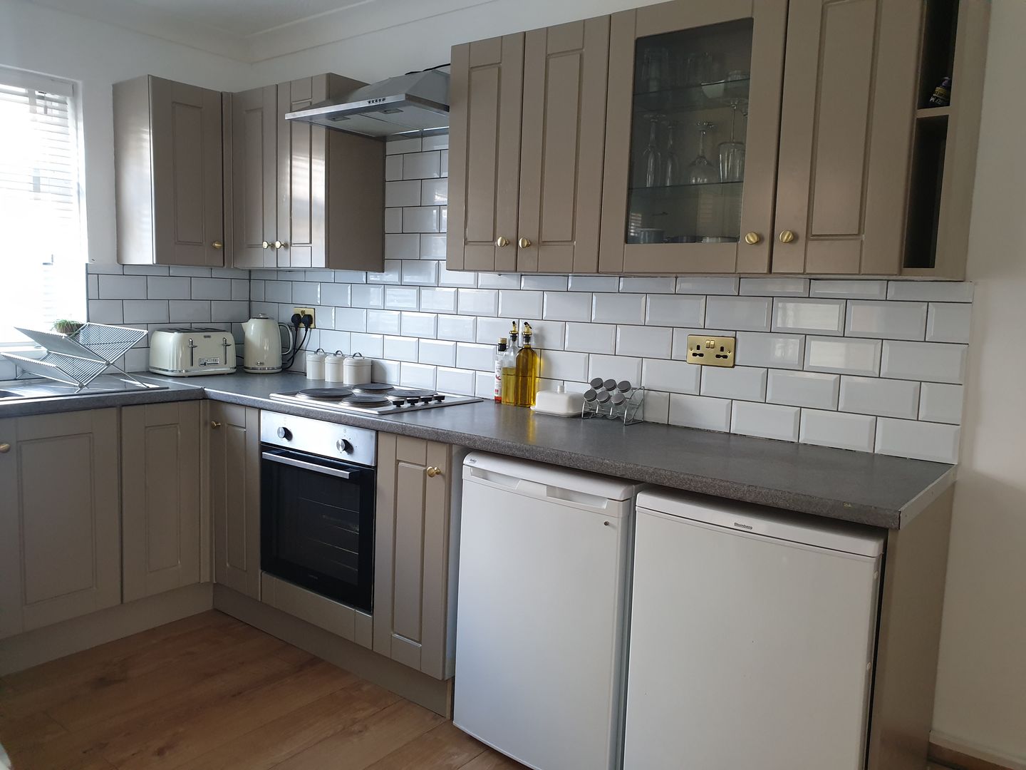 Customer photo review of Monmouth Brushed Satin Brass Cupboard Handles