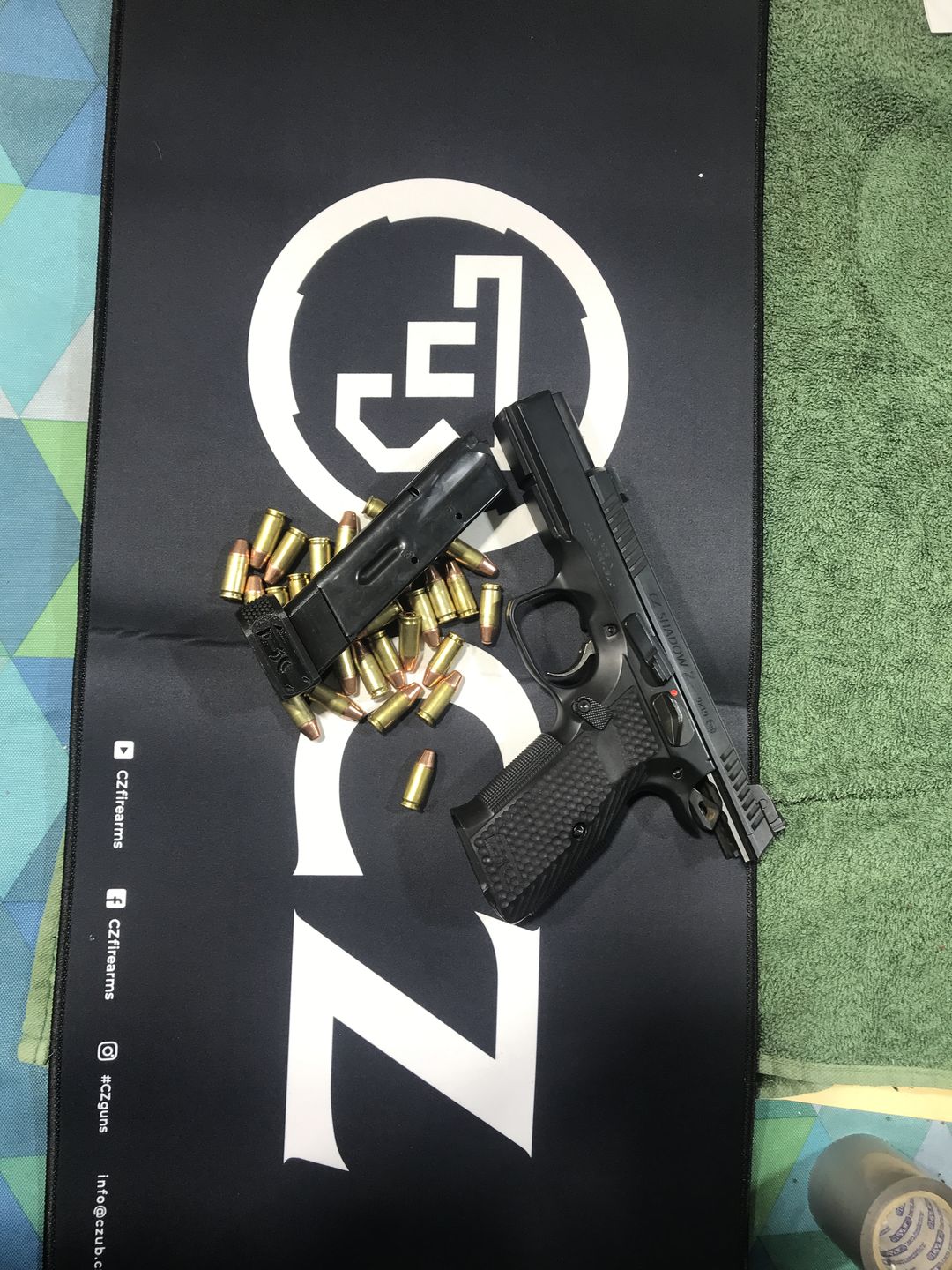 Customer photo review of CZ Shadow 2 Stainless Steel Extended Magazine Release Button