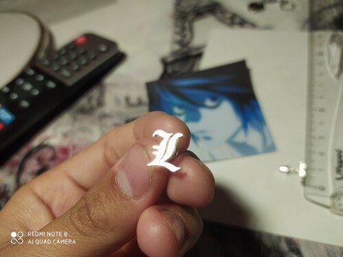 Customer photo review of Boucles d'oreilles lettres initiales en ancien anglais en acier chirurgical