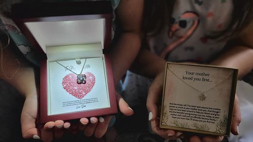 Customer photo review of To My Daughter From Dad Love Knot Necklace