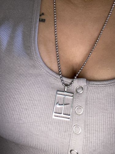 Customer photo review of Collier Swoosh Argent