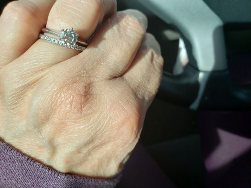 Customer photo review of Moissanite Round Half Eternity Sterling Silver Wedding Band Stackable Ring