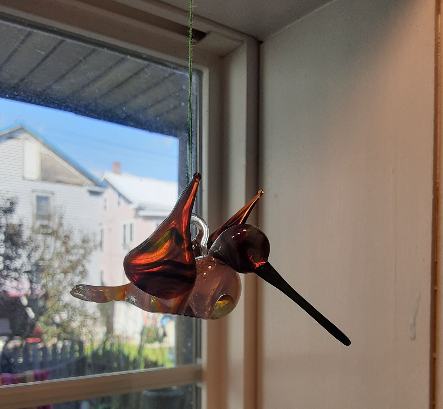 Customer photo review of Purple and Amber Glass Hummingbird Figurine with Cremains