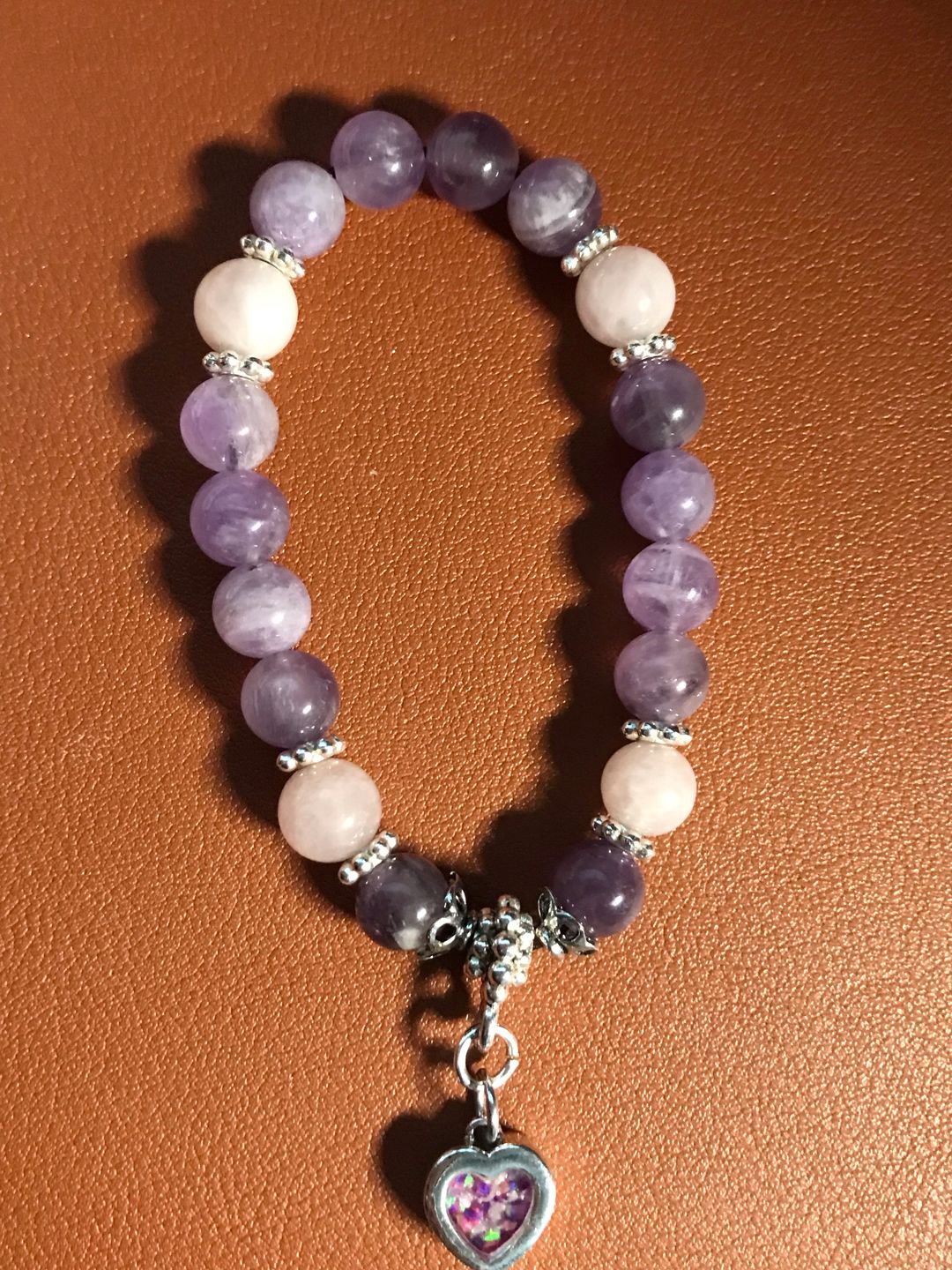 Customer photo review of Amethyst and Rose Quartz Healing Bracelet with Cremation Ashes