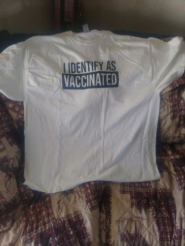 Customer photo review of I Identify As Vaccinated Unisex Tee