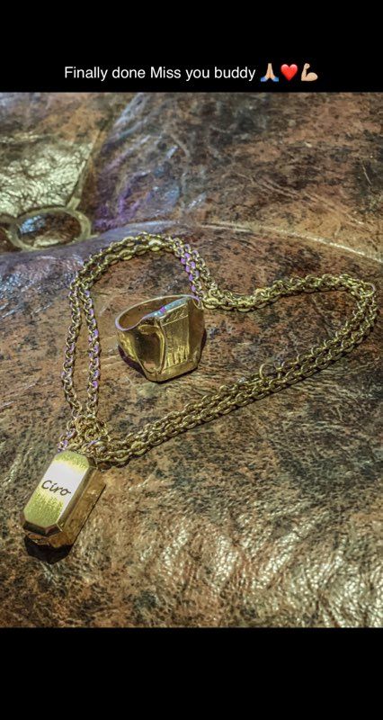 Customer photo review of Engravable Dog Tag Cremation Urn Pendant