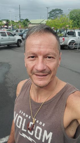 Customer photo review of Koa Wood with Hawaii Island Map Carving Fish Hook Necklace