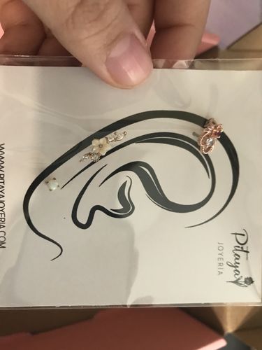 Customer photo review of Piercing 1era Perforación Ópalo Blanco Titanio