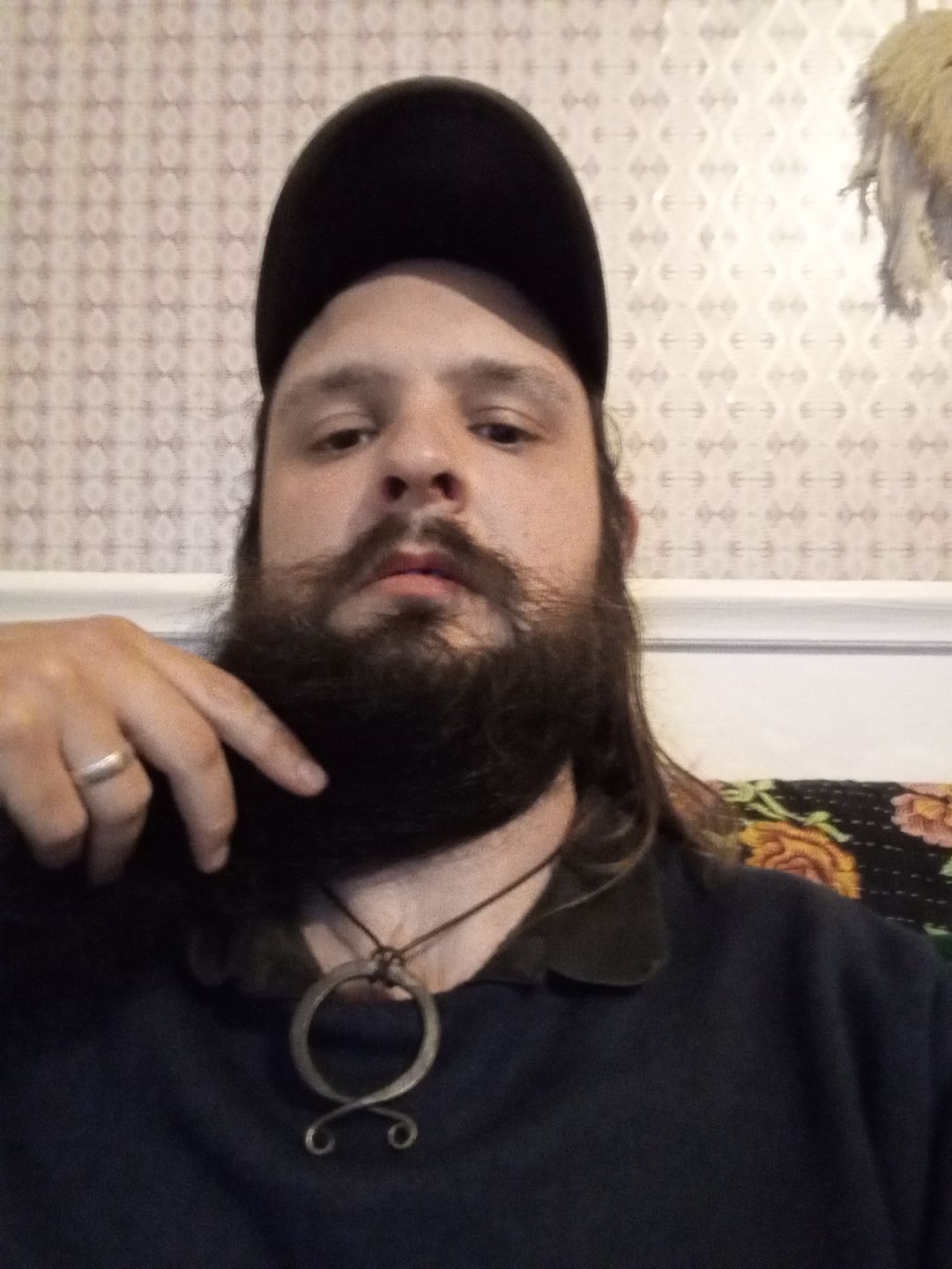 Customer photo review of Smooth Troll Cross Pendant