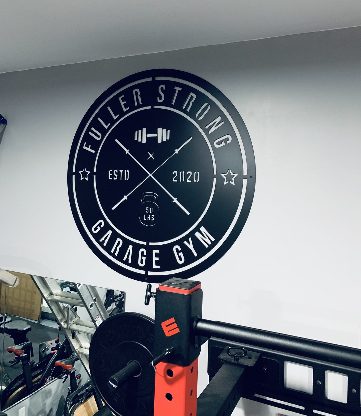 Customer photo review of Crossed Barbell Gym Sign