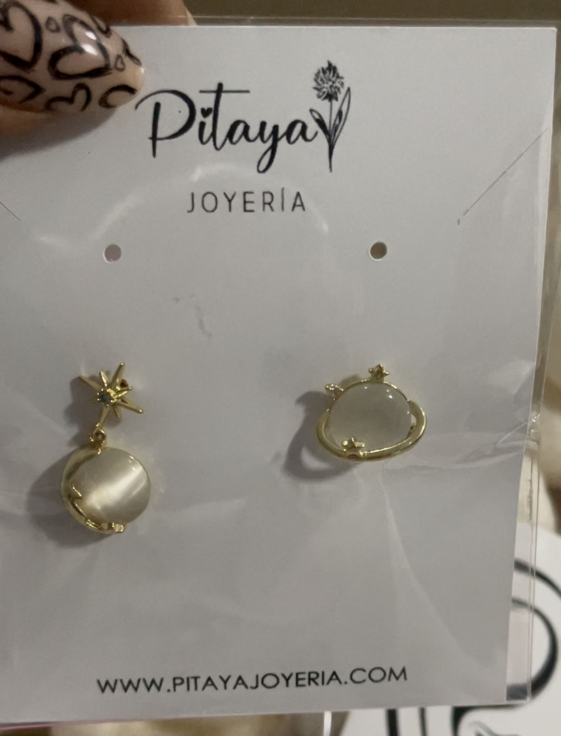 Customer photo review of Aretes de Saturno de Ópalo