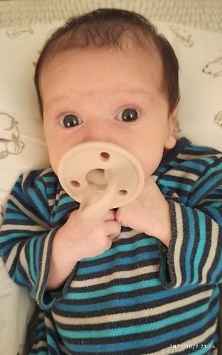 Customer photo review of Chupete New Rosa pálido Nenina & Co