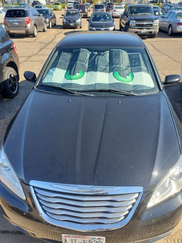 Customer photo review of Black Suspicious Cartoon Eyes Car Sunshade Custom Car Windshield Accessories