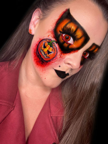 Customer photo review of EYEVOS Dangerous Ruby Colored Contact Lenses