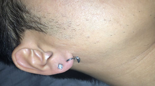 Customer photo review of VVS Moissanite Solitaire Stud Earrings