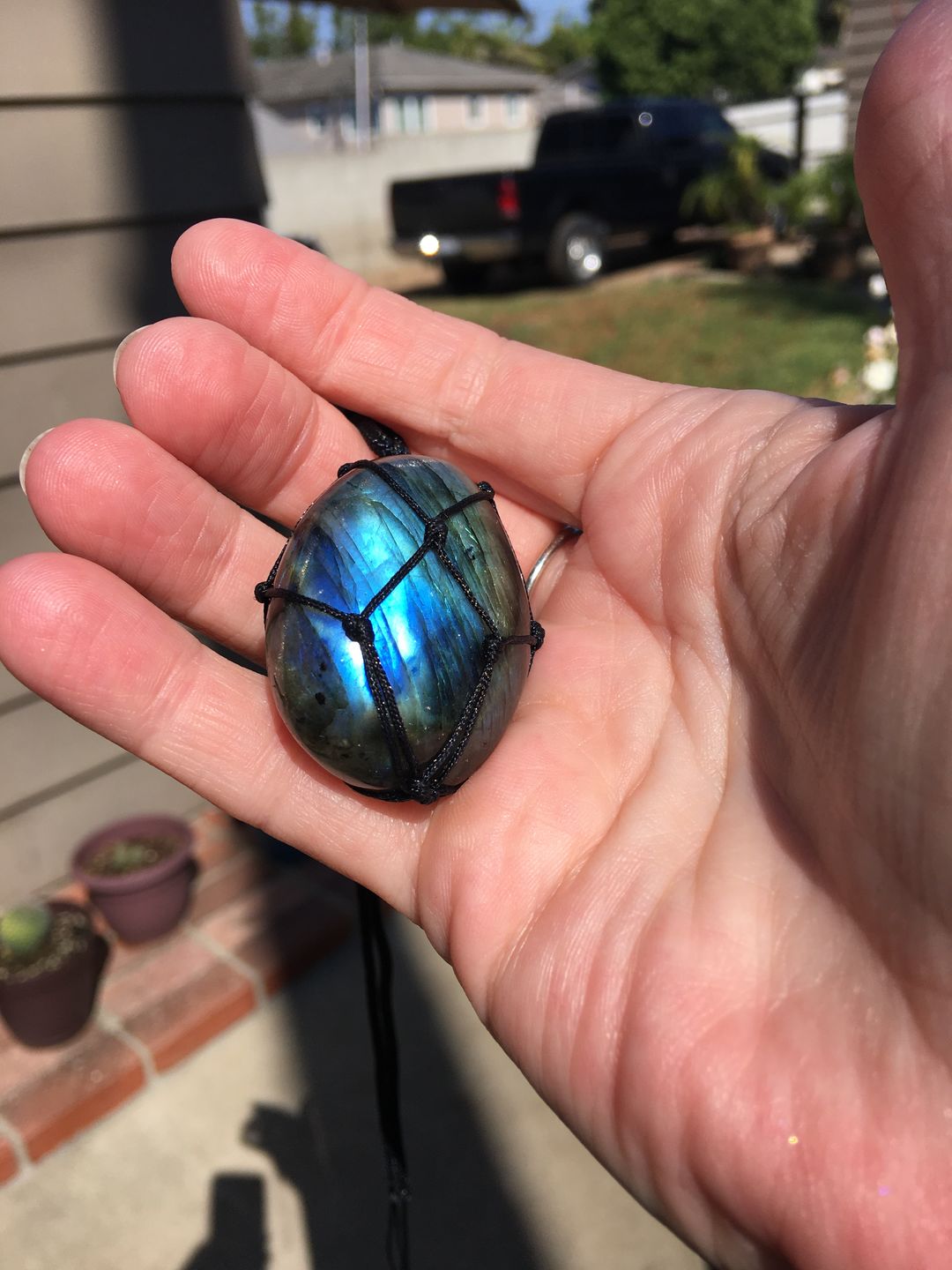 Customer photo review of Dragon's Heart Labradorite Necklace