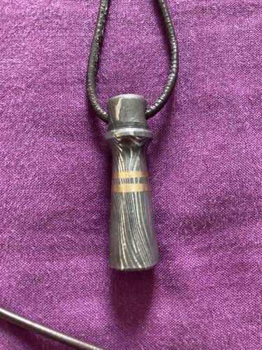Customer photo review of Damascus Chess Piece Pendant