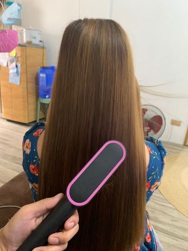Customer photo review of 2in1 Professional Electric Hair Straightening/Curl Comb + Free Shipping