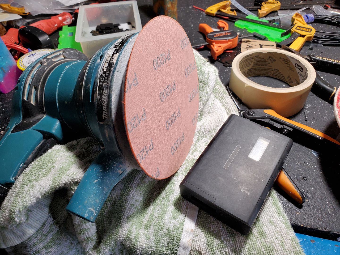 Customer photo review of 5 Inch Hook and Loop Orange Wet / Dry Auto Body Film Sanding Discs, 50 Pack