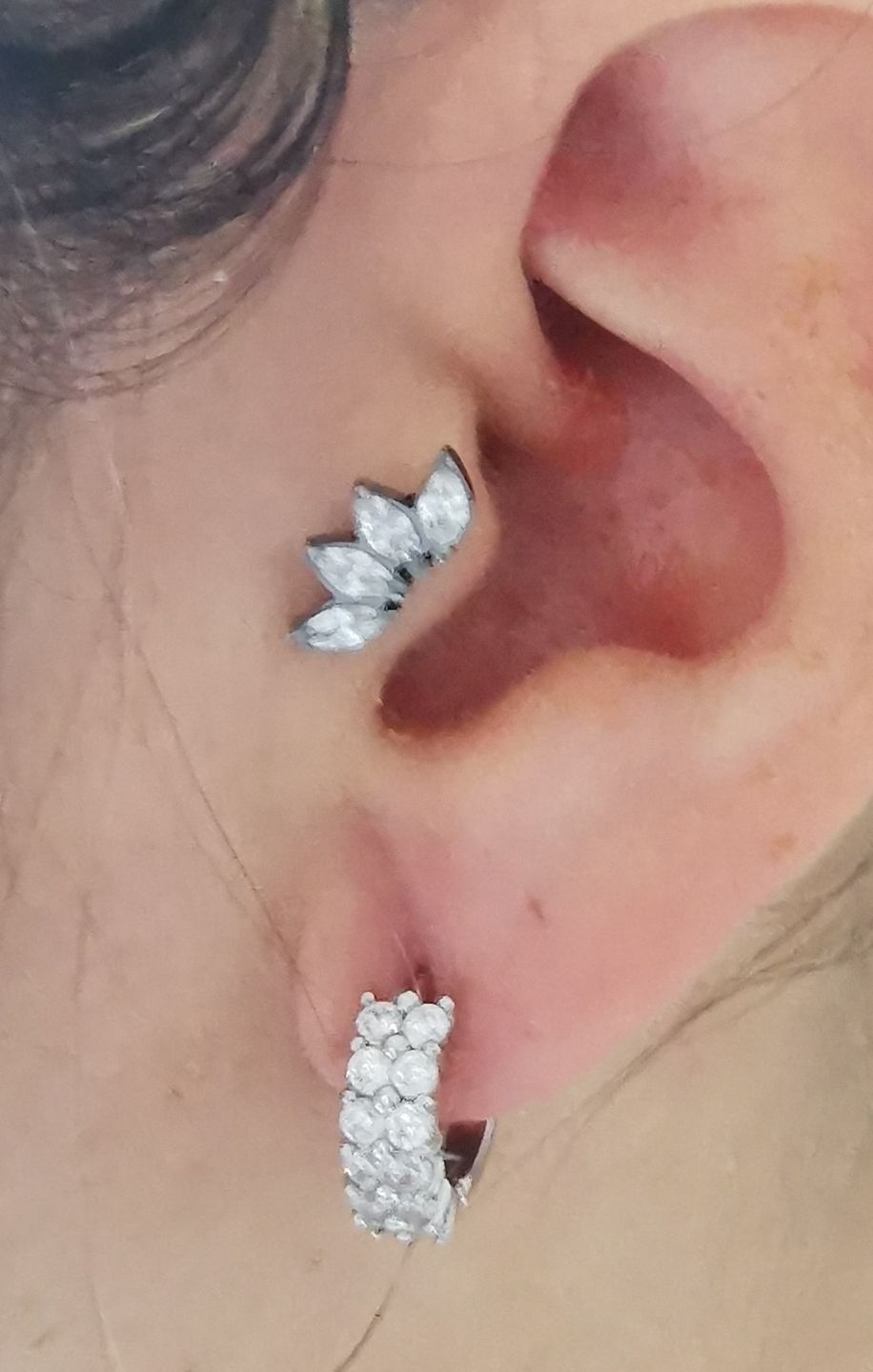 Customer photo review of Lotus Piercing | Titan