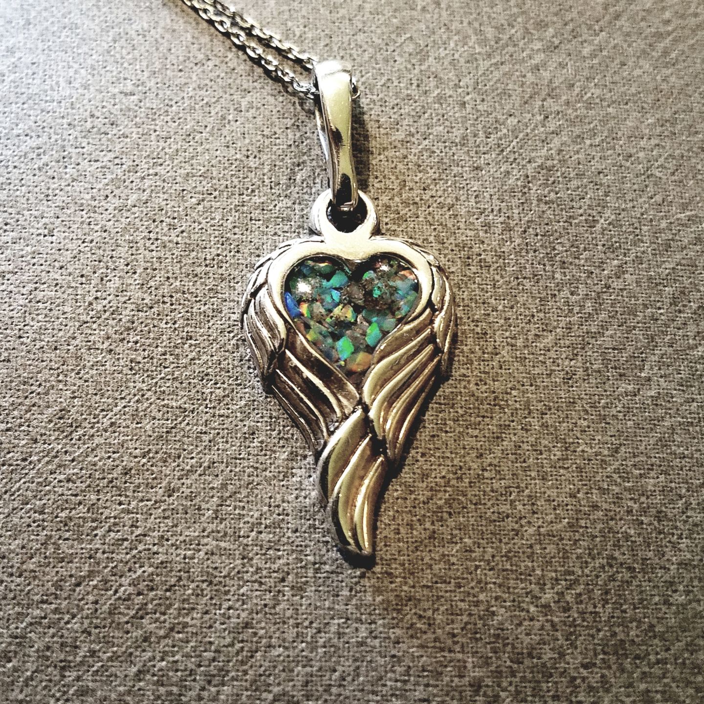 Customer photo review of Petite Angel Wing Pendant - Engravable