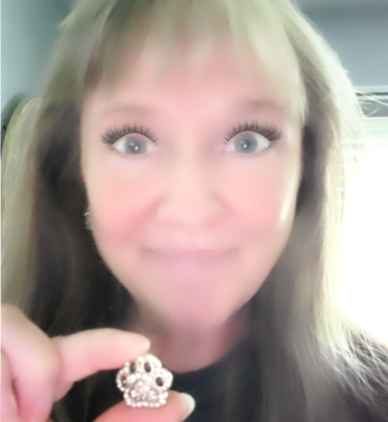 Customer photo review of HEIDI DAUS®"Pretty Paw Print" Crystal Paw Earring
