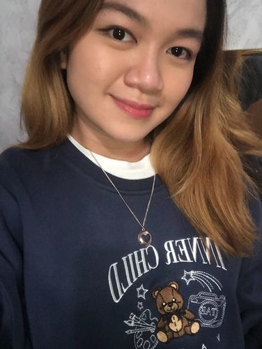 Customer photo review of Inner Child Crewneck Sweater