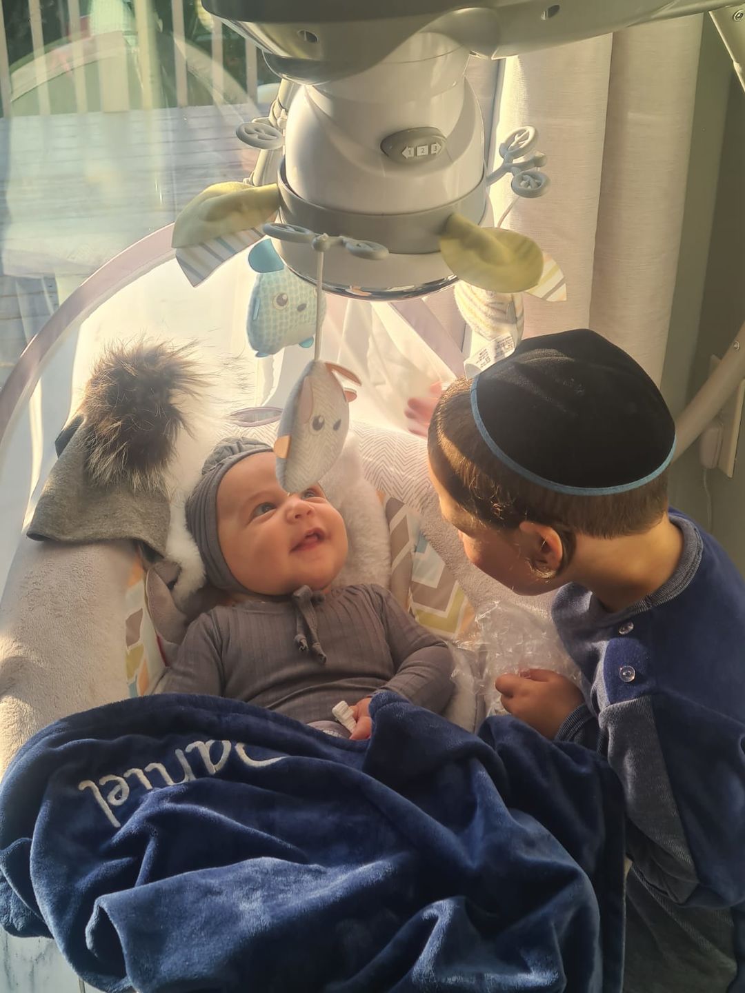 Customer photo review of Minky Bee  Stroller Blanket Grey/Navy