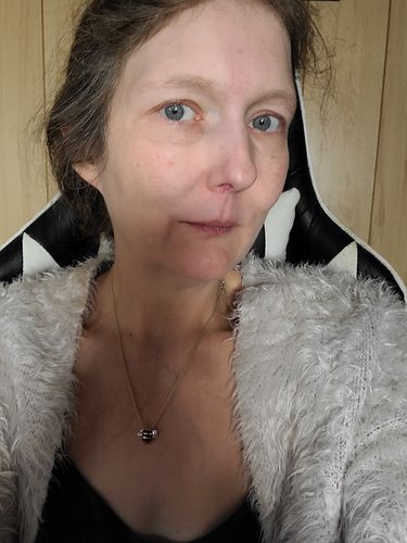 Customer photo review of Original Adopt a Bee Necklace