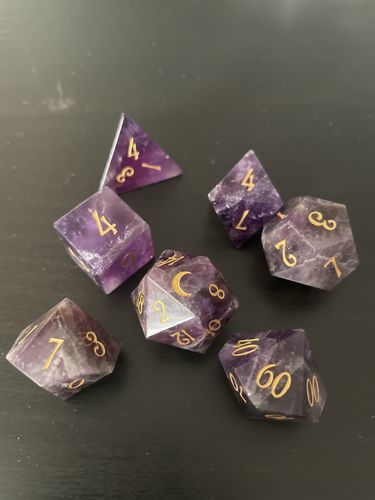 Customer photo review of URWizards D&D Amethyst Engraved Dice Set Moon Style