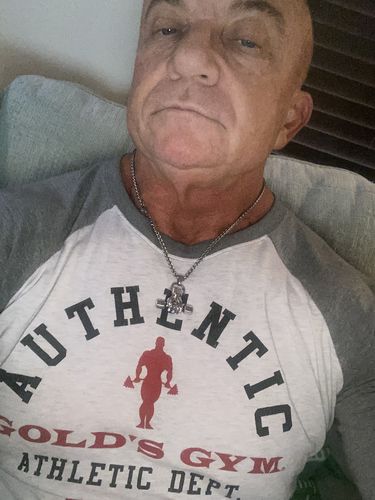 Customer photo review of Hand of Zeus Dumbbell necklace
