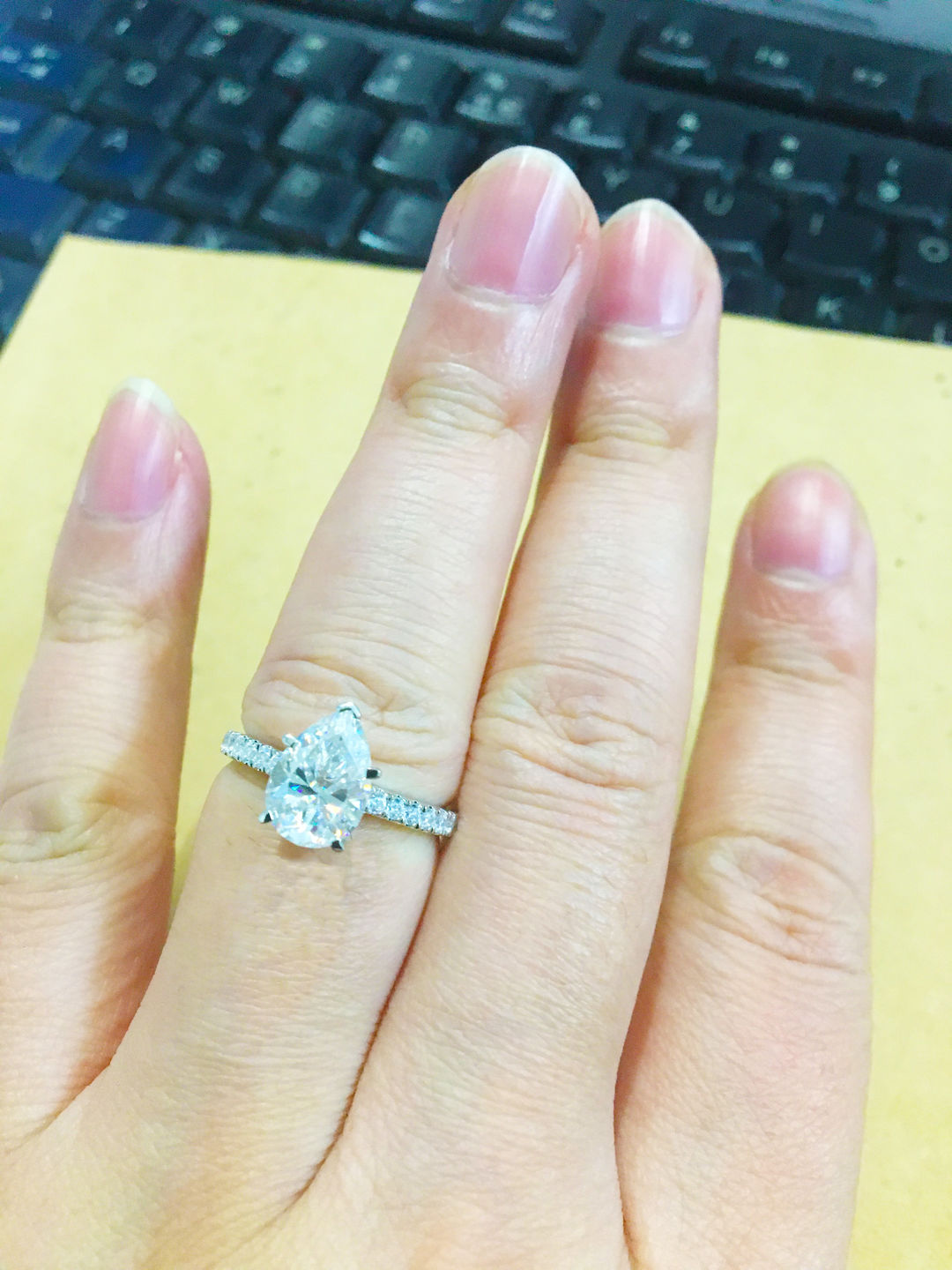 Customer photo review of Pear Cut Moissanite Pavé Engagement Ring